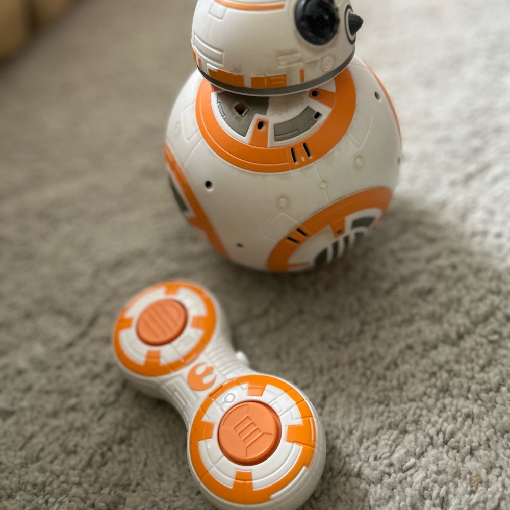 Star Wars BB8 remote control android. White and Orange. Squeaks like a droid.